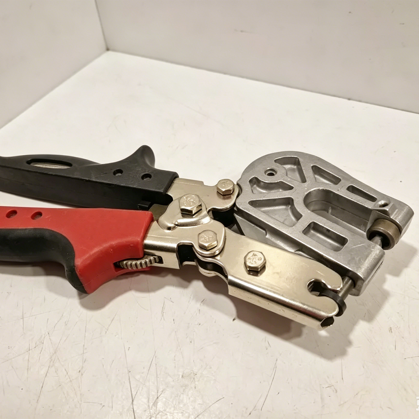 Adjustable Deep Throat Hole Punch Tool with Compound Lever Mechanism