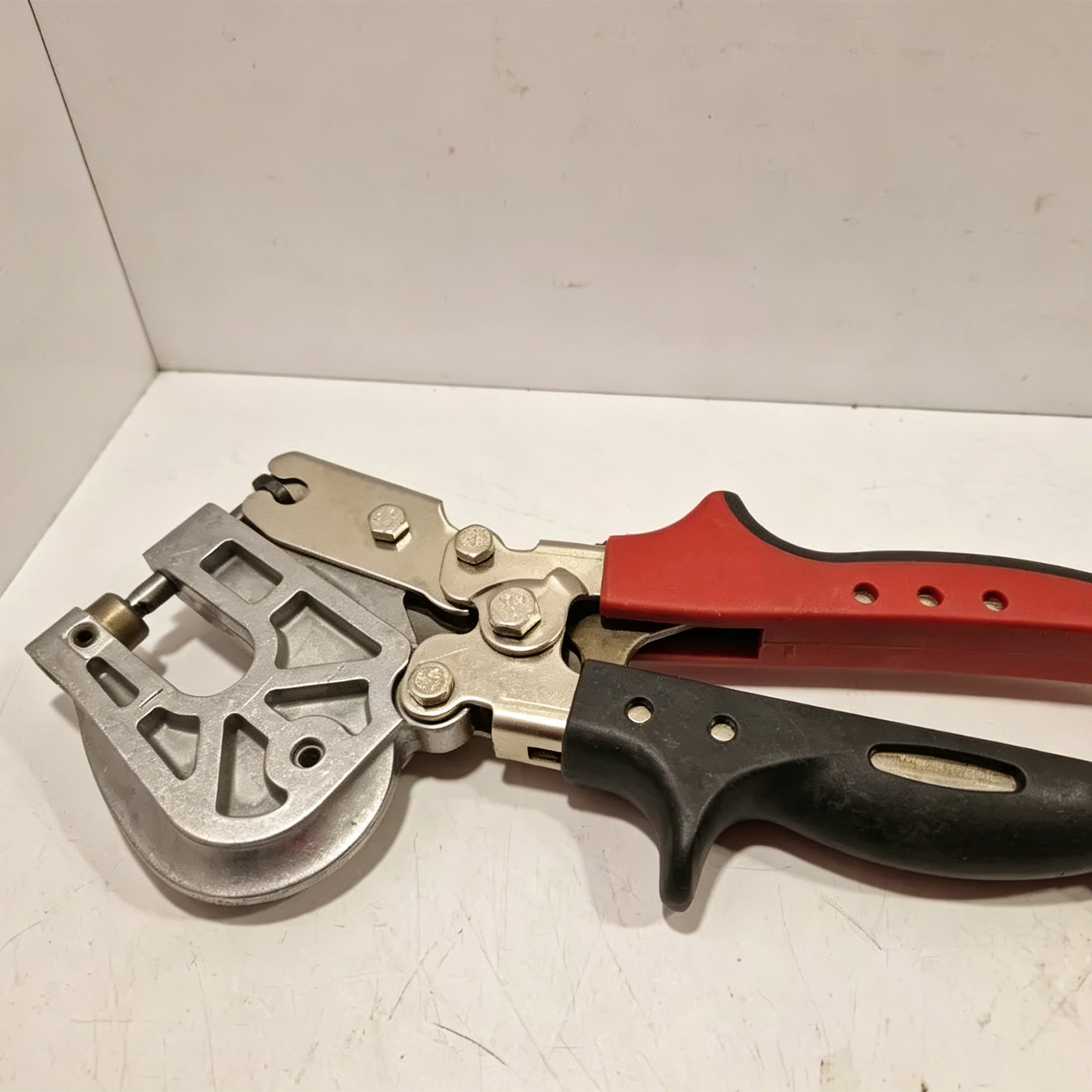 Adjustable Deep Throat Hole Punch Tool with Compound Lever Mechanism