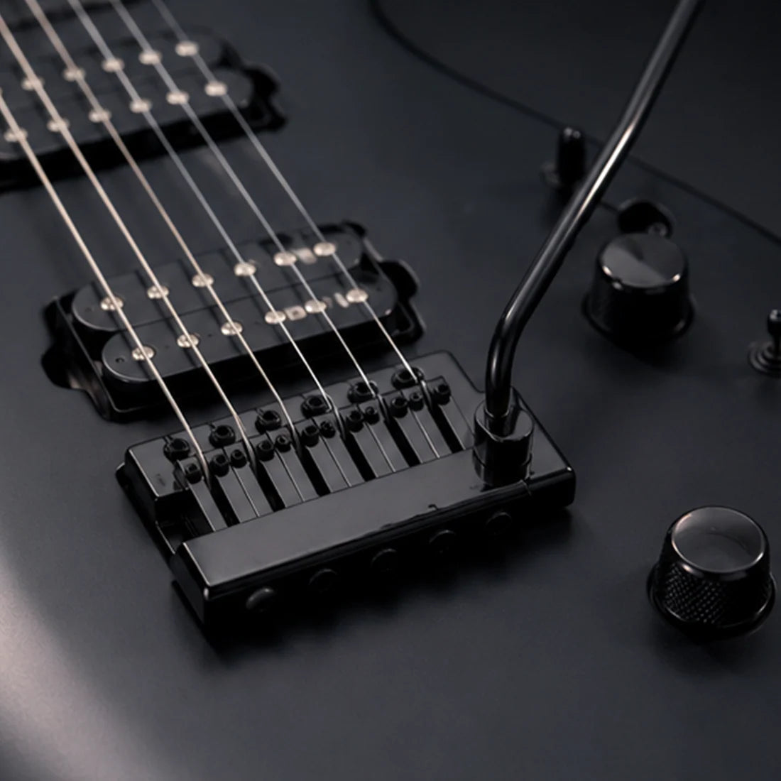 Plug-in guitar tremolo bridge