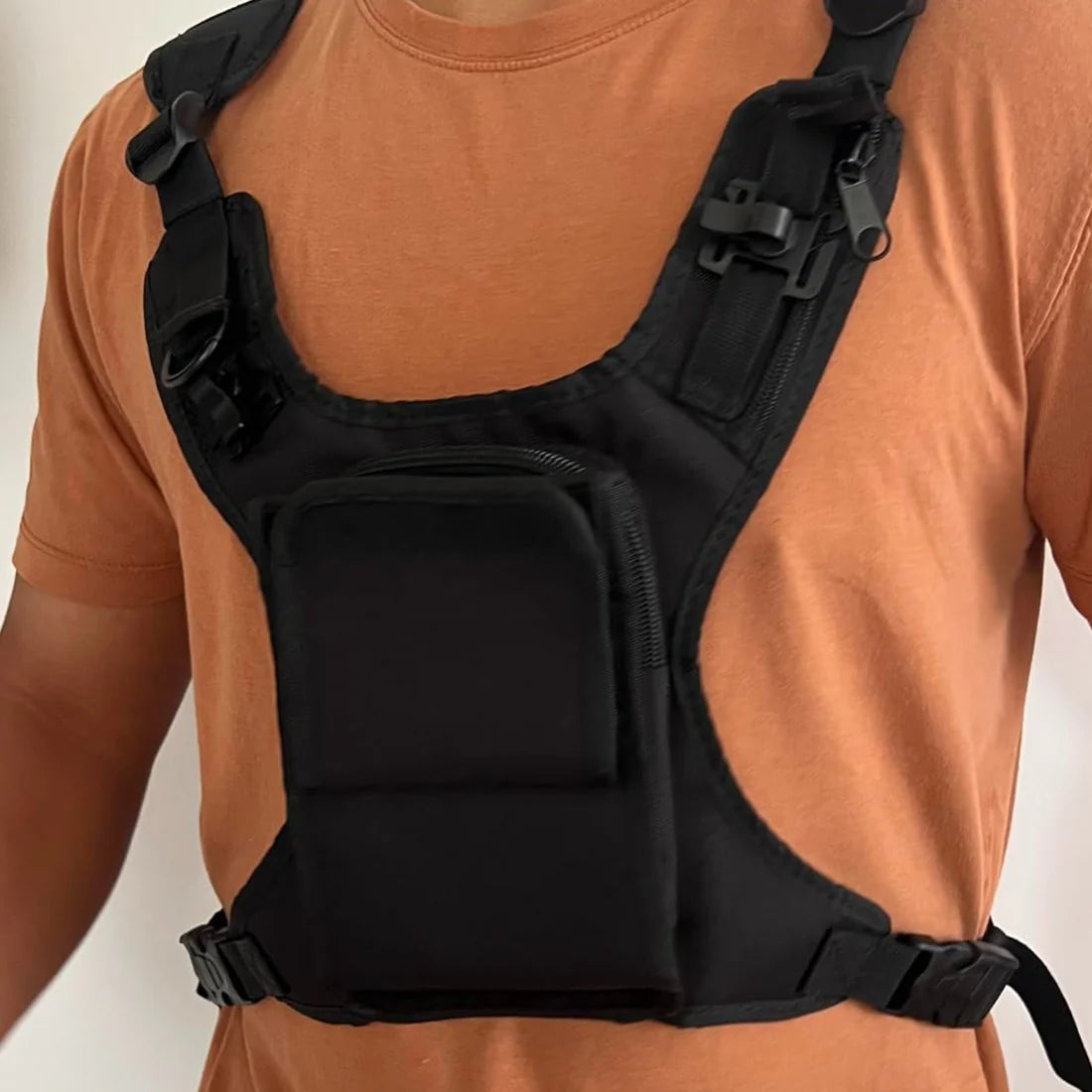 Running chest pack with holster and phone pocket